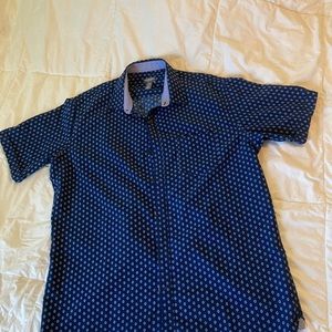 Van Heusen “never tuck” shirt